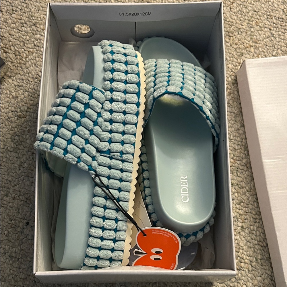 Cider Light Blue Textured Slide Sandals